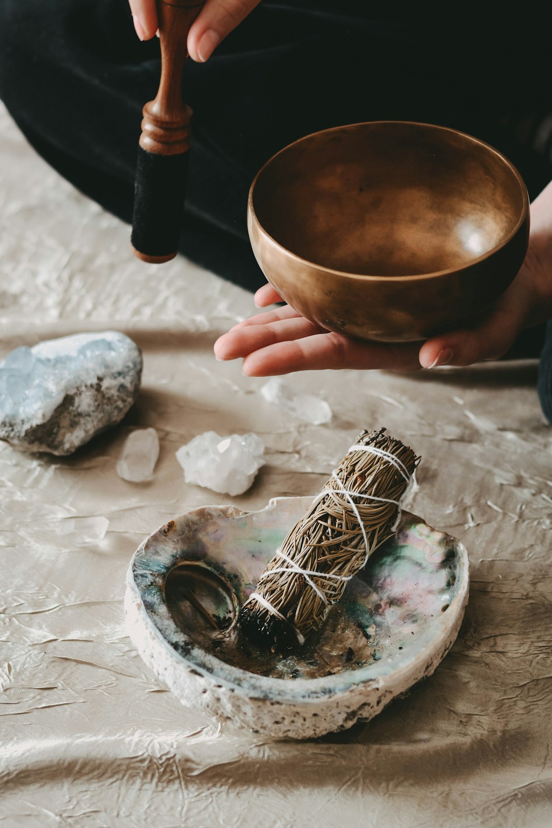 Girl holding a gold Tibetan bowl during a holistic sound healing ritual ✦ Snag more FREE stock photos each month ???? https://contentpixie.com/secret-snaps/